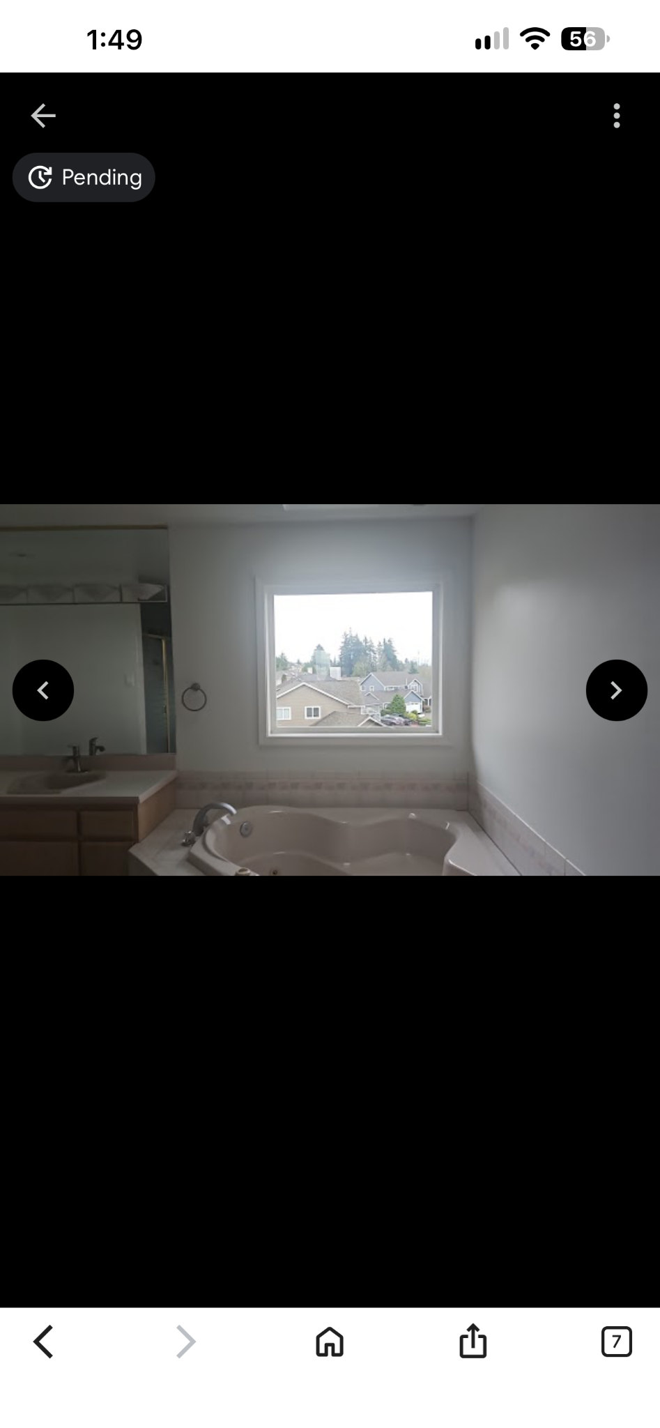 White-framed window above a bathtub, shown in a user-supplied project photo
