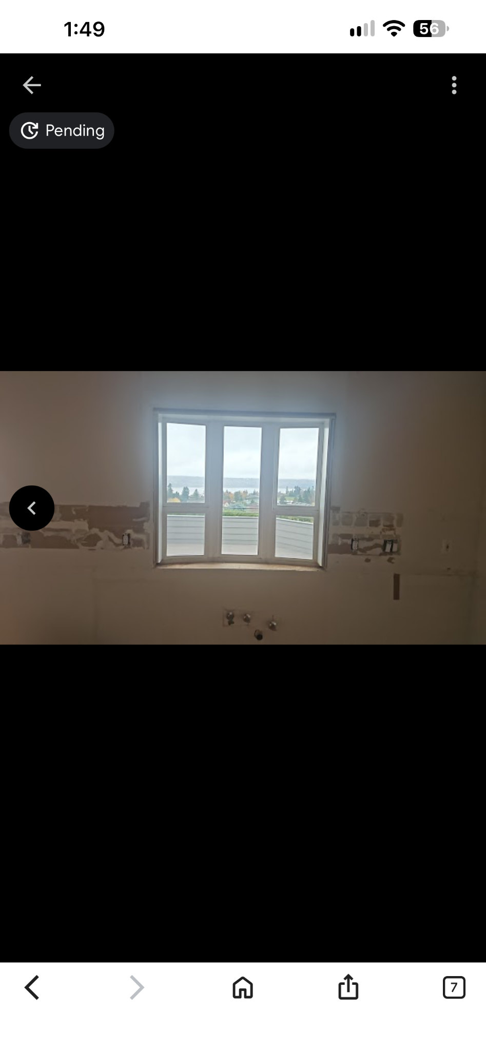 Multi-panel window with unfinished surrounding wall, shown in a user-supplied project photo